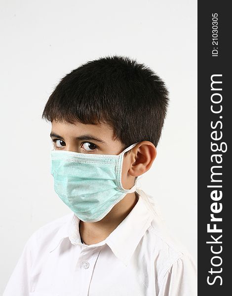 Flu illness child boy in medicine healthcare mask. Flu illness child boy in medicine healthcare mask