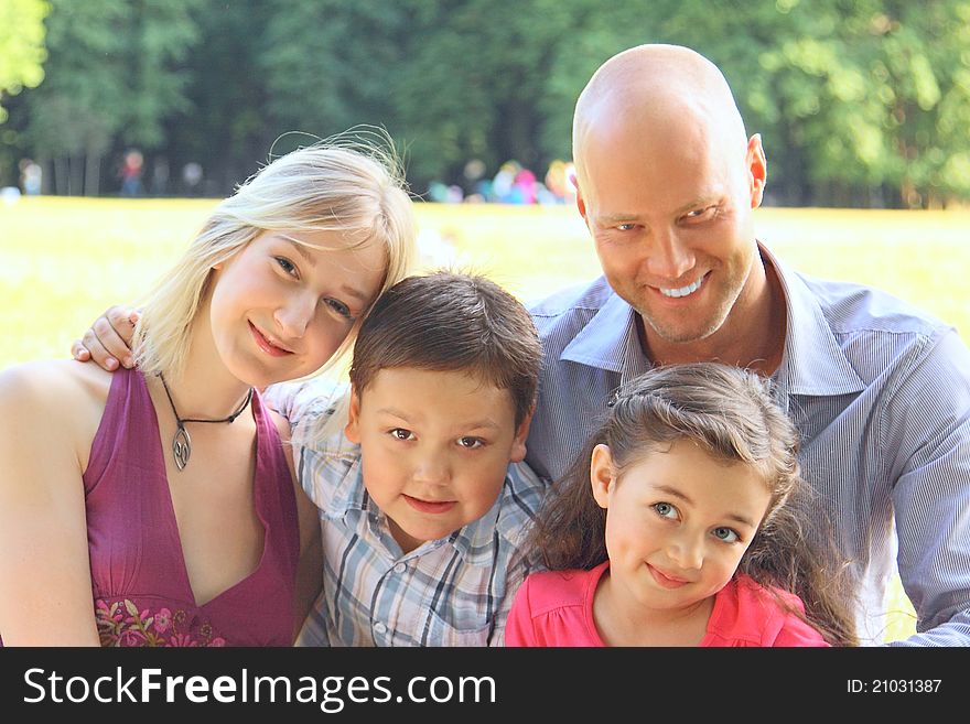 Group portrait of the big and happy family on walk in park. Group portrait of the big and happy family on walk in park