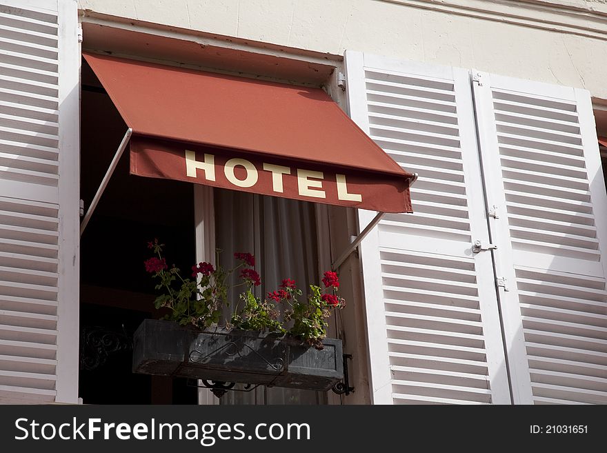 Hotel Sign over Window in Paris, France