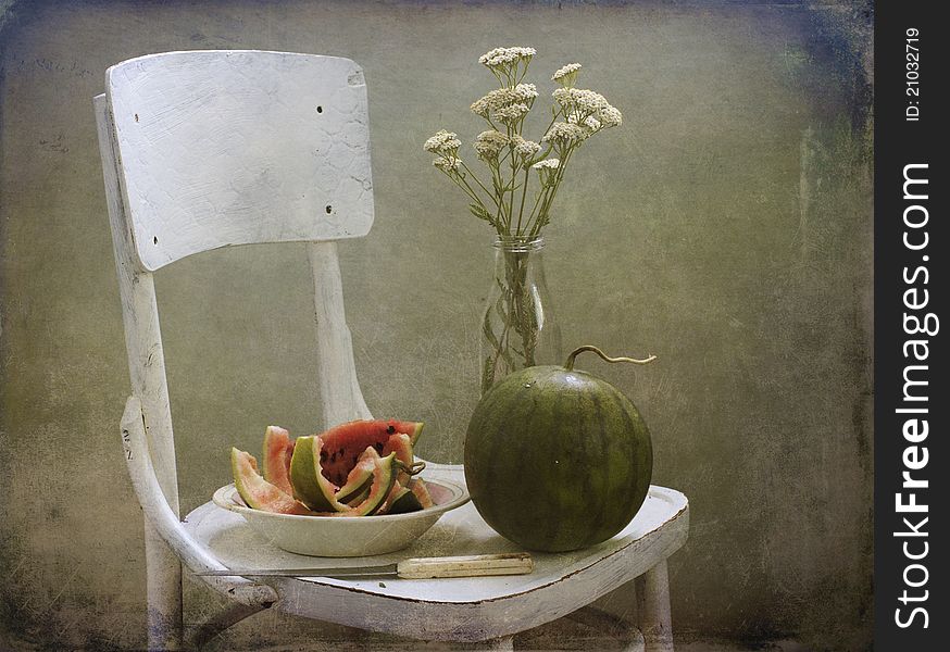 Still life with a water-melon and field flowers. Still life with a water-melon and field flowers