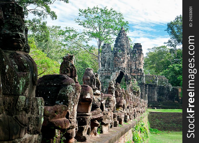 The Eastern Gate of Angkor and the entrance to Angkor Thom, with a row of statues from Hindu mythology.