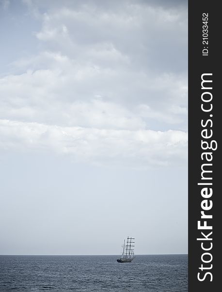 Image of vintage style. Old sailing ship in the sea .