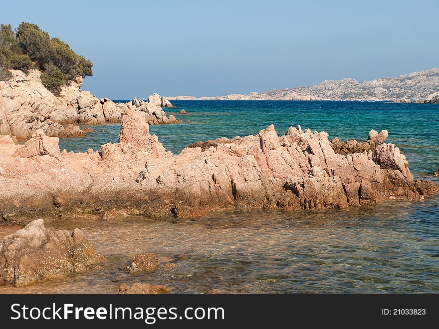 Pink granite rocks on the sea on La Maddalena in Sardinia. Pink granite rocks on the sea on La Maddalena in Sardinia