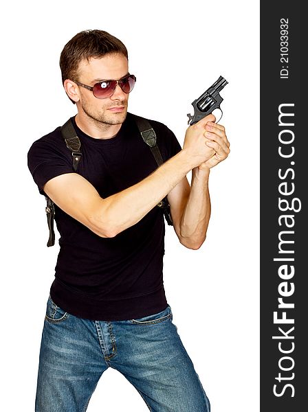 Man with a gun in the holster