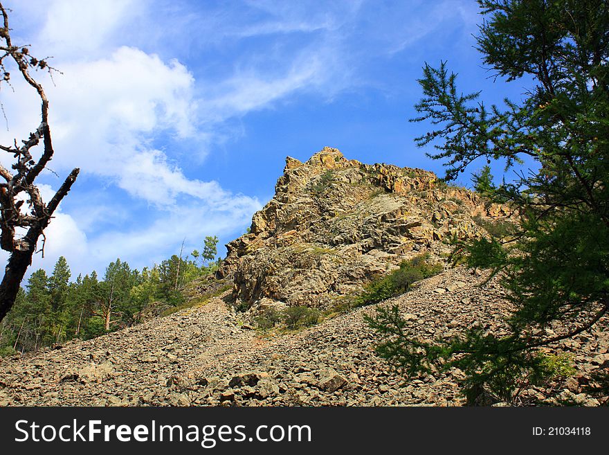 Beautiful rock and a blue summer sky. Beautiful rock and a blue summer sky