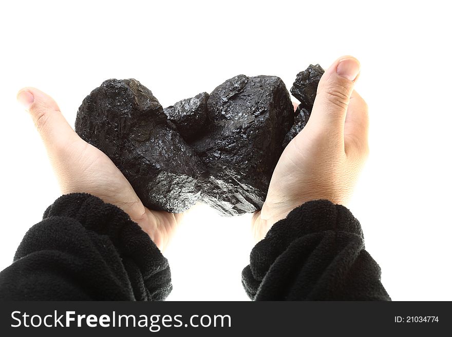 Pieces Of Coal In Hand Isolated