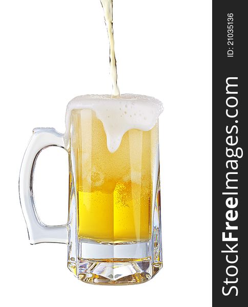 Beer being poured into a glass on a white background