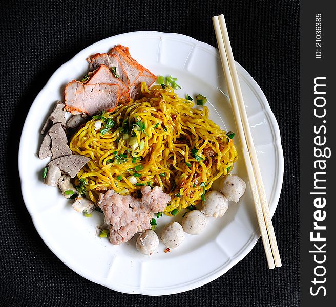 Wheat noodles on black background. Wheat noodles on black background