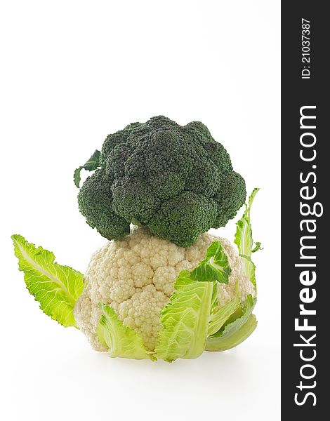 Cauliflower and broccoli stack on white background