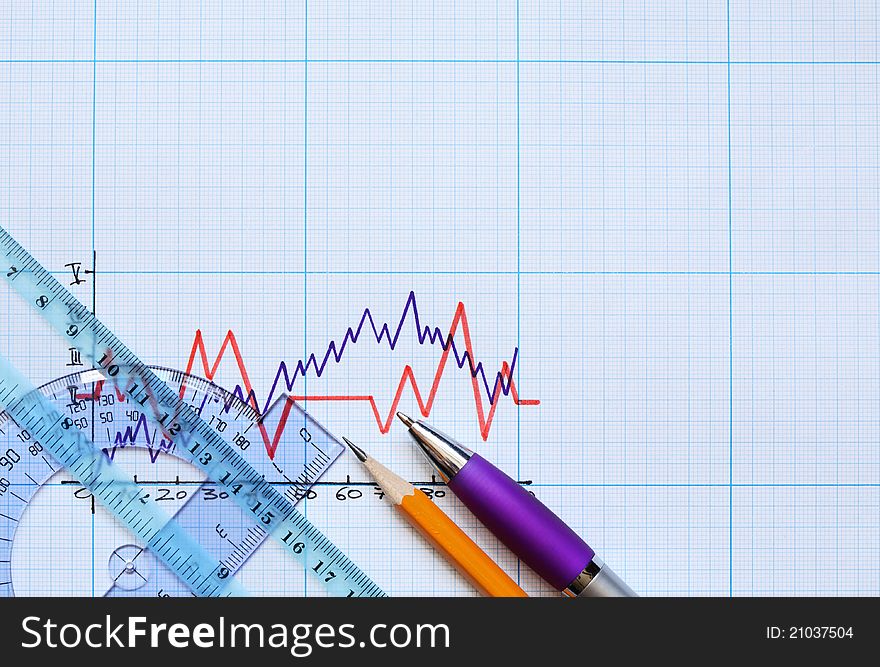 Rulers and pencil on graph paper with diagram. Rulers and pencil on graph paper with diagram