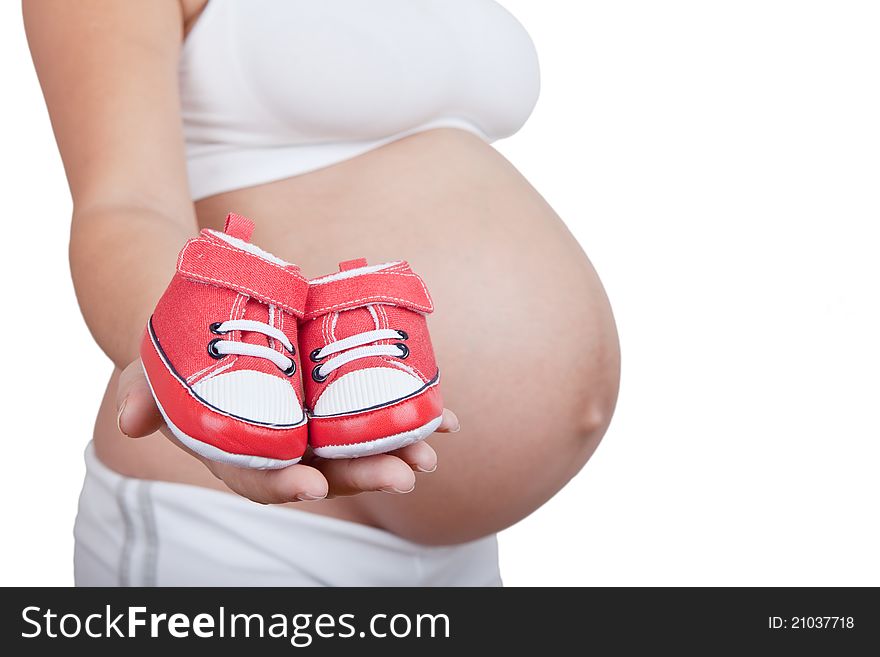Pregnant Woman Hold In Hand Red Baby Boots