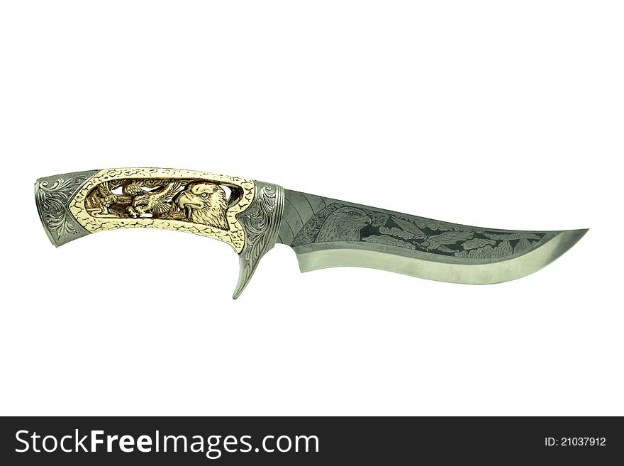 Exotic knife with eagle carvings isolated on white