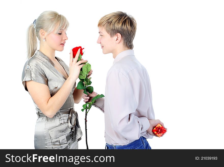 Valentine day - time for gift, couple with gift and flower isolated on white