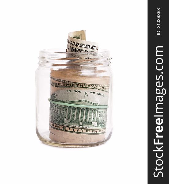 Glass pot with dollars on the white background