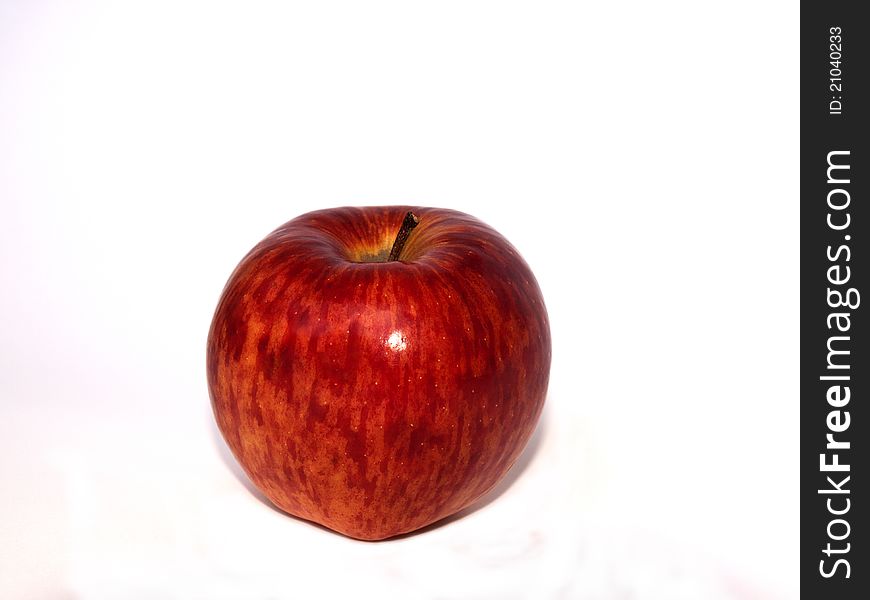 Fresh red apple isolated on a white background