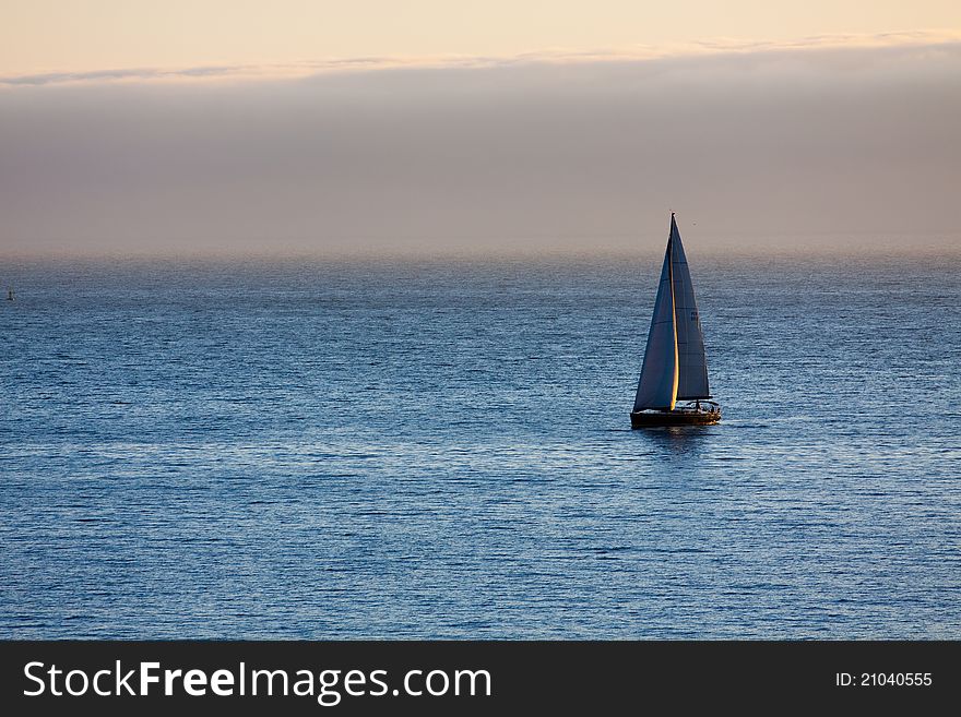 Boat In The Atlantic Ocean At The Evening