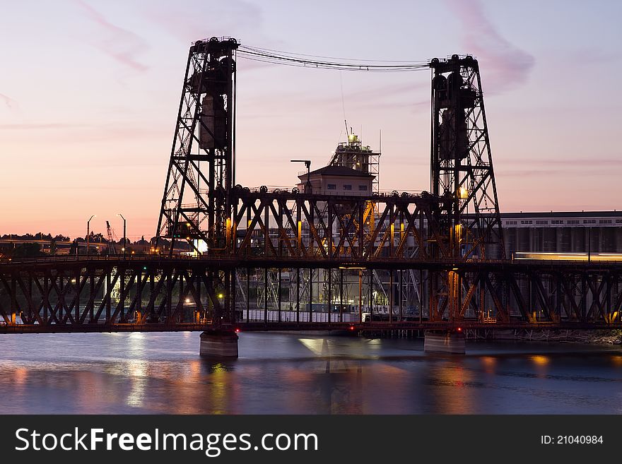 Steel Bridge over Willamette River in Portland Oregon at Sunset. Steel Bridge over Willamette River in Portland Oregon at Sunset