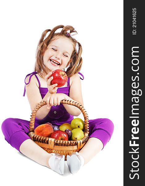 Girl holding a basket of fruit. Girl holding a basket of fruit