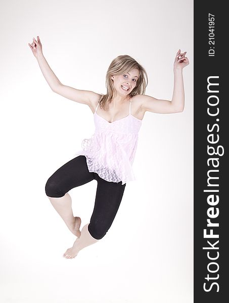 Jumping girl in the studio