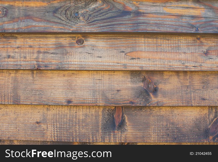 Horizontal wooden fence texture close up