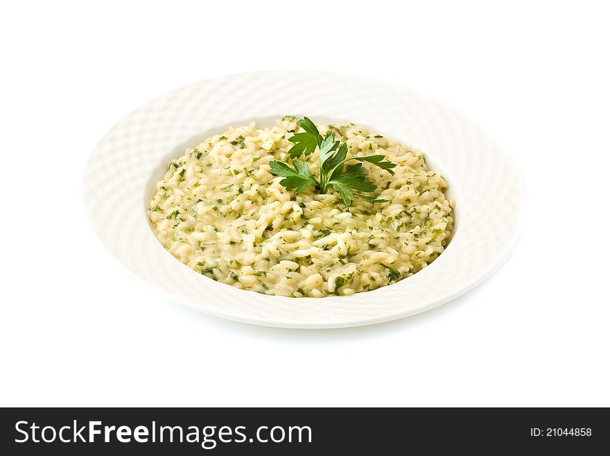 Photo of delicious risotto dish with herbs on white background. Photo of delicious risotto dish with herbs on white background