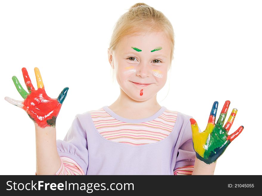 Cute girl playing with colors on a white background.