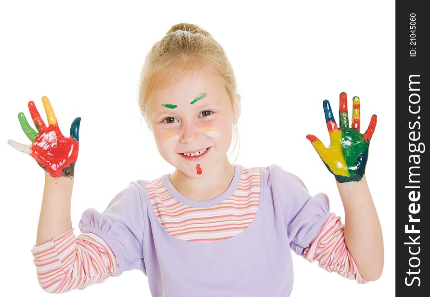 Cute girl playing with colors on a white background.