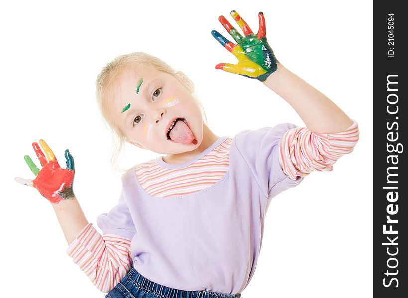 Cute girl playing with colors on a white background.