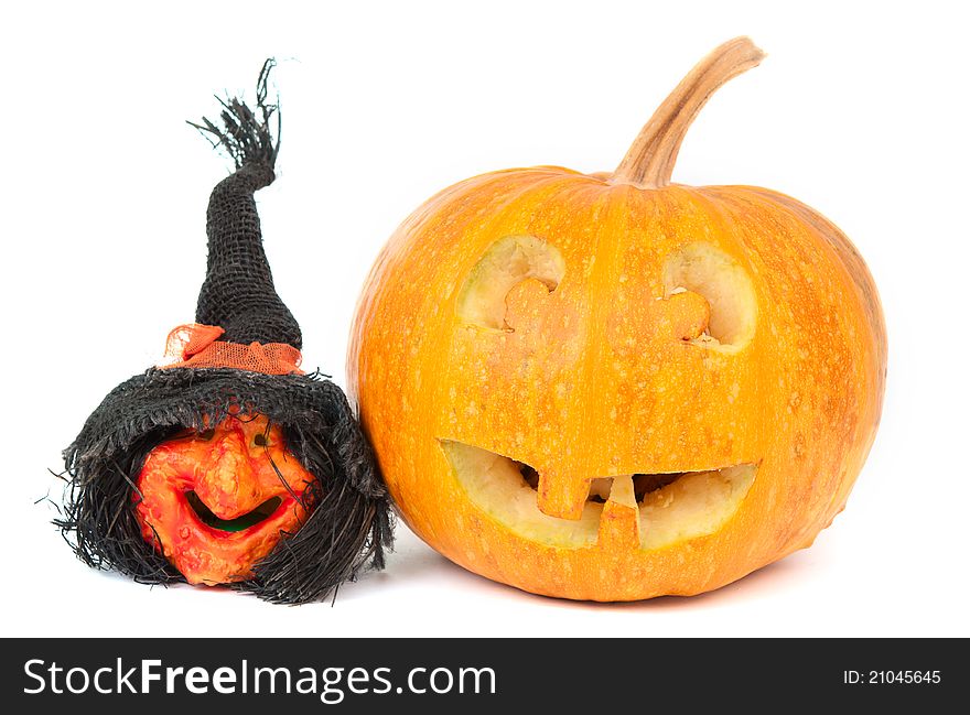 Pumpkin and witch on Halloween on a white background