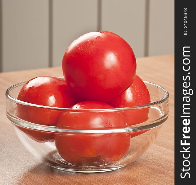Tomatoes In A Glass Bowl