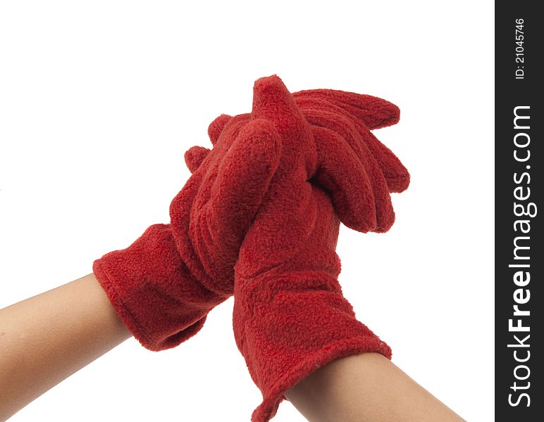 Red autumn gloves on his hands on a white background