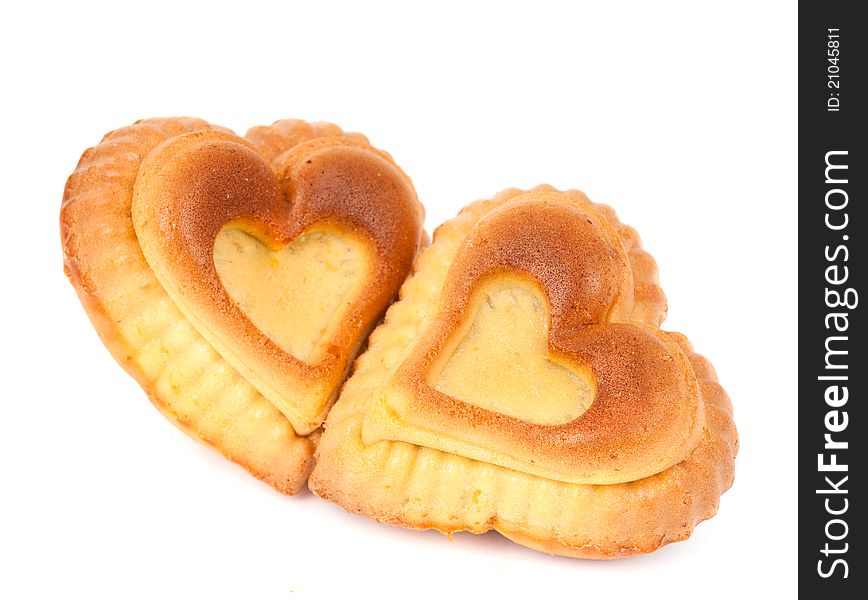 Muffins in a heart on a white background