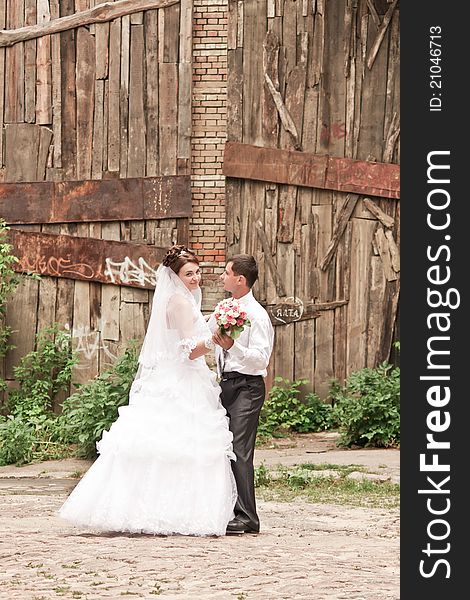 Bride and groom dancing outdoor