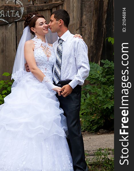 Bride and groom dancing outdoor