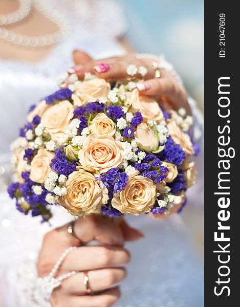 Bride holding beautiful  wedding flowers bouquet. Bride holding beautiful  wedding flowers bouquet