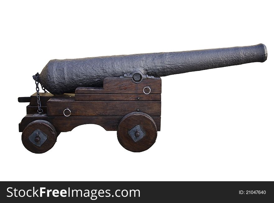 An old iron cannon with wooden base on wheels, with white background. An old iron cannon with wooden base on wheels, with white background