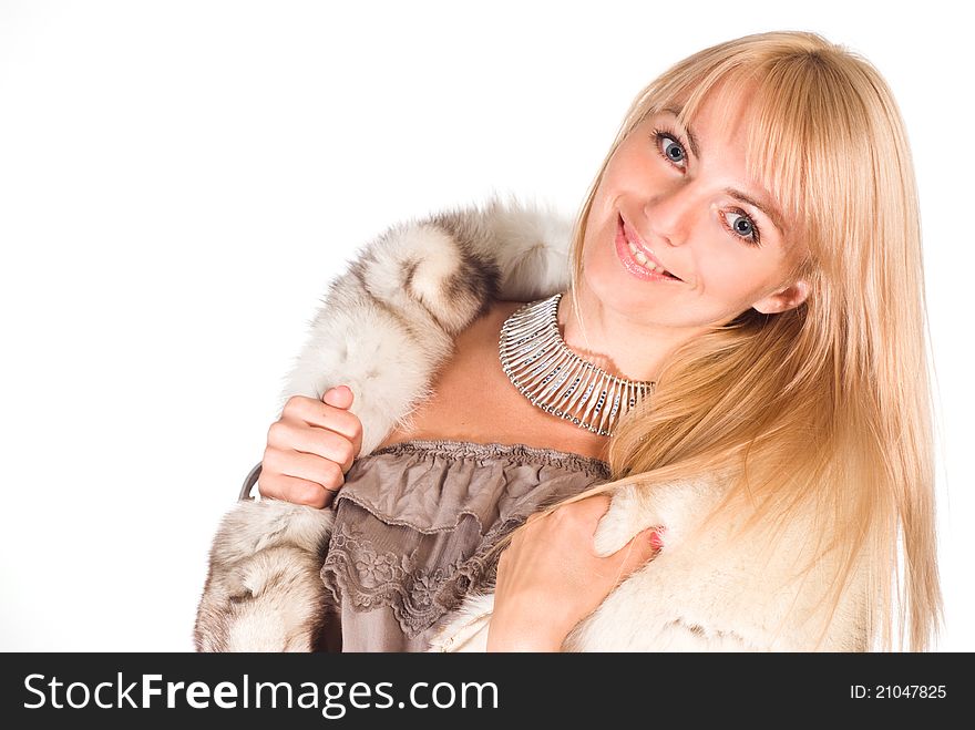Portrait of a cute girl in fur on white. Portrait of a cute girl in fur on white