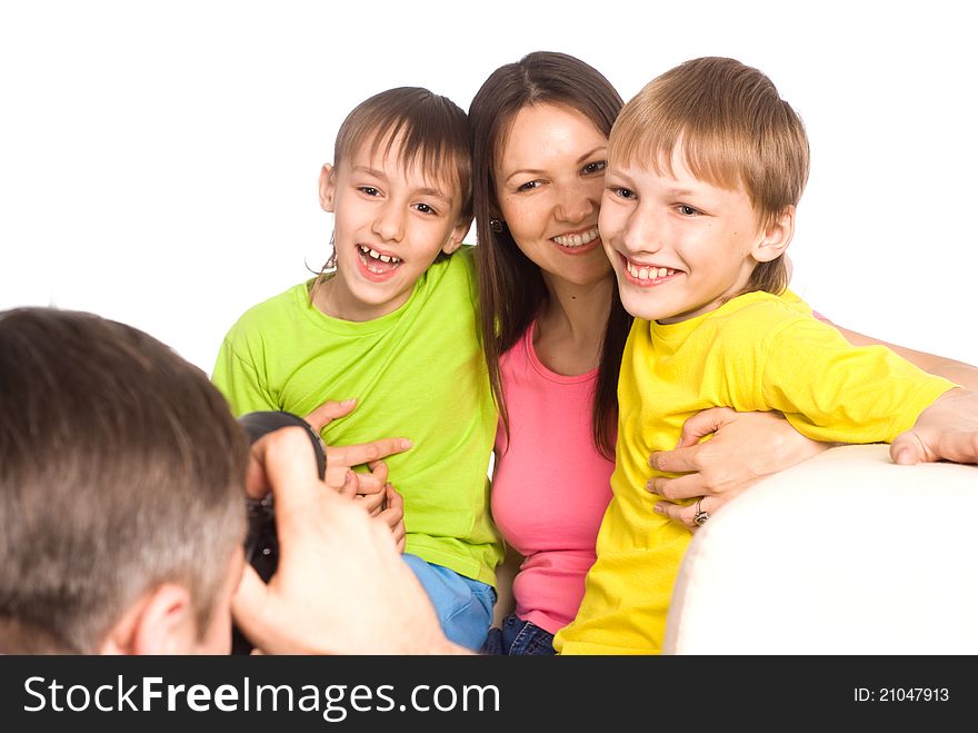 Dad with camera taking pictures of his family