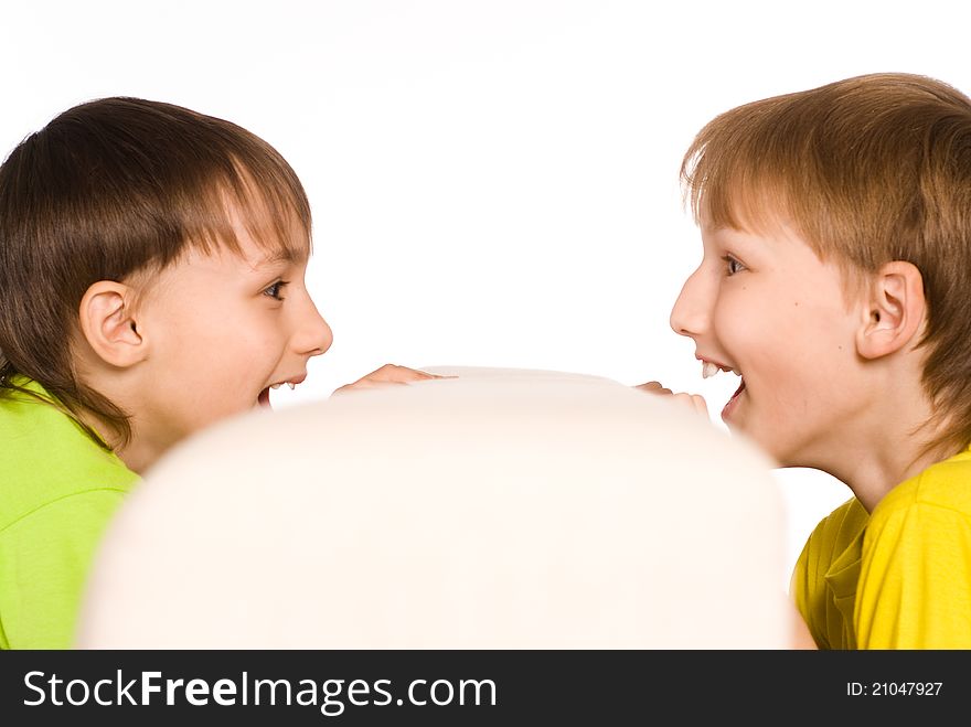 Two cute boys on a white background. Two cute boys on a white background