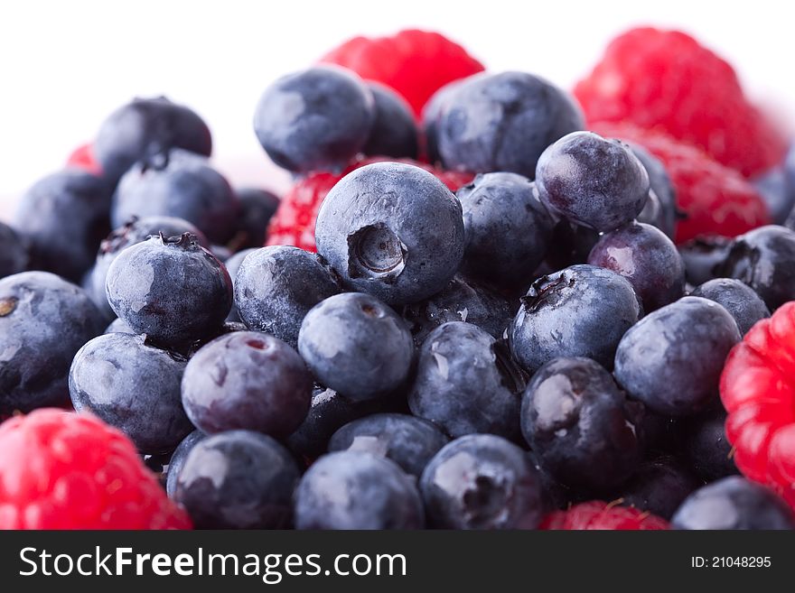 Close up of mixed berries in a bowl - shot in studio. Close up of mixed berries in a bowl - shot in studio