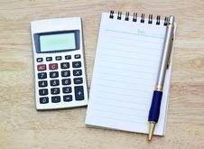 Notebook, Silver Ballpen And Calculator Stock Photo Notebook, Silver Ballpen And Calculator Stock Photo