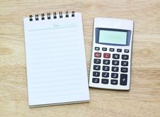 Calculator And Notebook On Table Royalty Free Stock Image