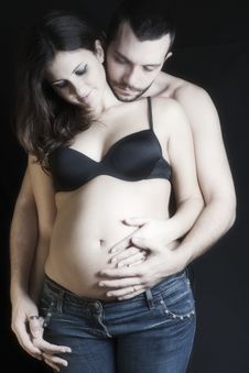Pregnant And Father Caressing The Belly Royalty Free Stock Images