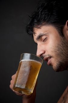 Indian Man Drinking Beer  From Beer Mug Royalty Free Stock Images
