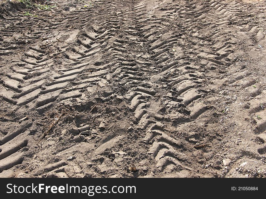 Traces of tires on soil