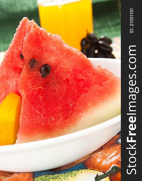 Watermelon pieces against colorful background