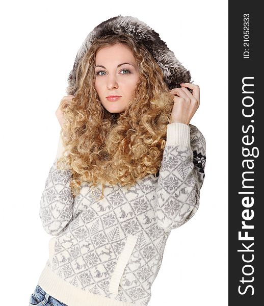 Portrait of the beautiful blond girl with curly hair