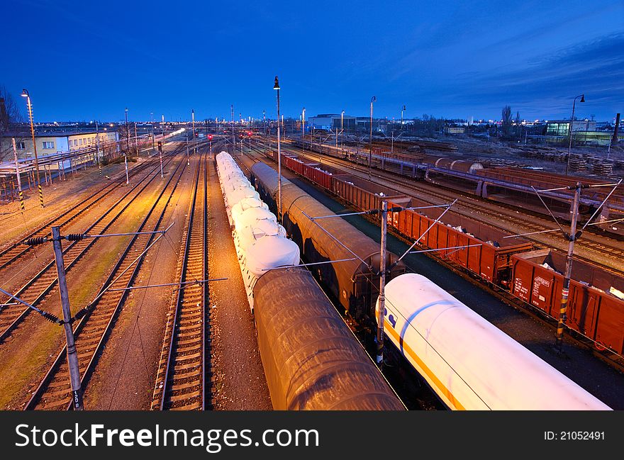 Freight Station with trains at twilight.