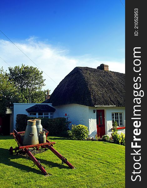 Old Style Irish Cottage Adare Co. Limerick on a sunny summers day