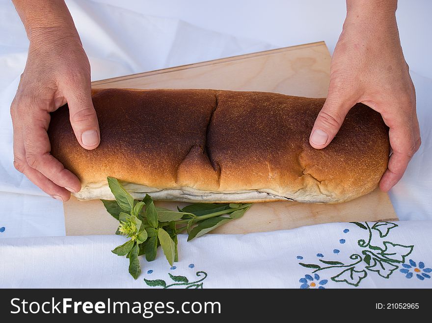 Middle woman with strudel in hands